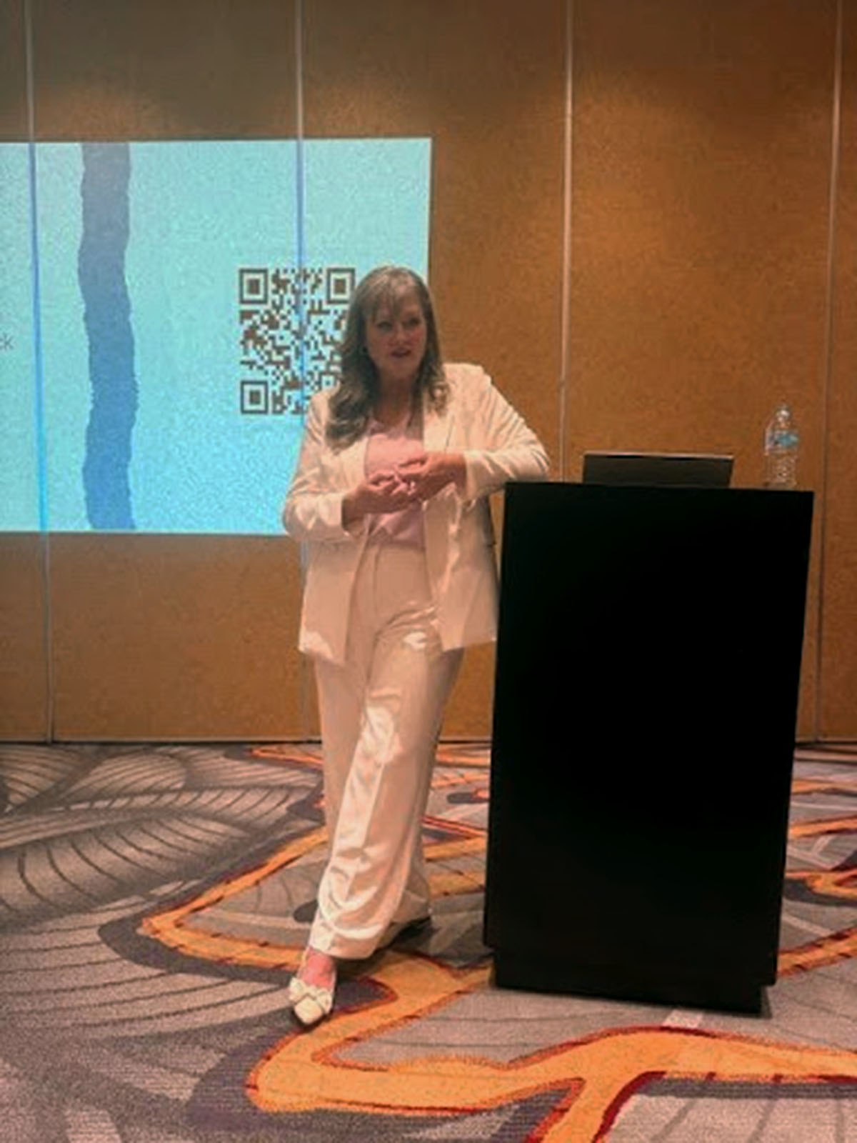 Lisa May LeBlanc speaking at the A.C.E.S. International Awareness Conference